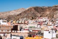 View from the fortress of Moorish houses and buildings along the port of Almeria, Spain