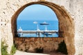 View through fortress window on sailing boats and yachts on blue sea Royalty Free Stock Photo