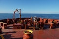 View from forward mooring station of cargo merchant container vessel sailing over Pacific Ocean towards Aleutian island.