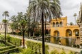View of a fountain in the gardens of the alcazar in seville spain