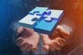 Four puzzle pieces making a logo on a futuristic interface - 3d Royalty Free Stock Photo