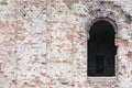 View of a fragment of an ancient building with a window Royalty Free Stock Photo
