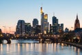 View of Frankfurt am Main skyline at dusk along Main river with Royalty Free Stock Photo