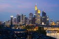 View of Frankfurt am Main skyline at dusk along Main river with Royalty Free Stock Photo