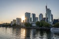 View on frankfurt skyline at sunset from eiserner steg bridge, frankfurt, hesse, germany