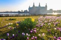 View of Frederiksborg castle in Hillerod, Denmark. Beautiful lake and garden with crocuses and daffodils on foreground Royalty Free Stock Photo