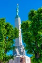 View of the Freedom monument from the Bastelkajna park in Riga, Royalty Free Stock Photo