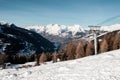 View of the French Alps, with majestic mountains in the distance, and a ski lift Royalty Free Stock Photo