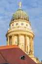 View on French Cathedral with red tiled roof in foreground at Gendarmenmarkt square in Berlin, Germany Royalty Free Stock Photo