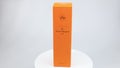 View of French champagne Veuve Clicquot in gift box, isolated on rotating gray background.