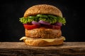 View of fresh tasty burger on wooden rustic table. Food background