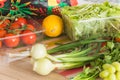 Fresh vegetables straight from the market unpacked in the kitchen.