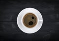 view of a freshly brewed mug of espresso coffee on rustic wooden background with woodgrain texture. Coffee break style, concept. Royalty Free Stock Photo