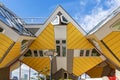 View of the front of the famous yellow cube houses, with their uneven doors, windows, floors and walls, designed by architect Piet