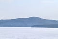 View of Frozen Lake Baikal in Winter from Listvyanka Town, Russia