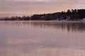 View of frozen lake with gulls sitting on ice Royalty Free Stock Photo