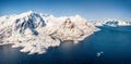View of frozen Vassdalsvatnet lake from flying drone. Aerial morning seascape of Norwegian sea.