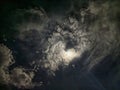 a view of the full moon with a dramatic sky filled with swirling clouds, creating a captivating and mystical scene Royalty Free Stock Photo
