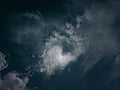 a view of the full moon with a dramatic sky filled with swirling clouds, creating a captivating Royalty Free Stock Photo