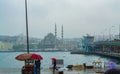 View of Galata Bridge on rainy spring day view Istanbul Turkey Royalty Free Stock Photo