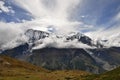 View of Gangapurna mountain in clouds. Himalaya mountains, Annapurna Circuit Trek, Manang District, Nepal, Asia. Royalty Free Stock Photo