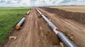 View of gas and oil pipeline construction. Pipes welded together. Big pipeline is under construction Royalty Free Stock Photo