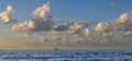 view gas platform against the backdrop of a flock of cranes in the clouds Royalty Free Stock Photo