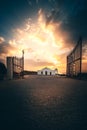 view through a gate to the typical greek church Chapel of Agios Nikolaos on zakyntos, sunrise Royalty Free Stock Photo