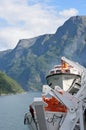 View of Geirangerfjord Norway from rear of cruise ship Magellan with lifeboats in foreground Royalty Free Stock Photo