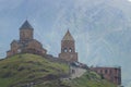 View of Gergeti Trinity Church (Tsminda Sameba) in Kazbegi, Georgia. The Church near the village of Gergeti Royalty Free Stock Photo