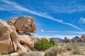 View of giant rock formations on a hiking trail at Joshua Tree National Park. Royalty Free Stock Photo