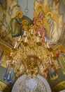 Gilded chandelier in the interior of the medieval chapel in the Alexander Svir Monastery in Karelia