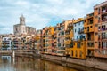 View of Girona Cathedral and multi colored houses from bridge on the Onyar River, Girona Royalty Free Stock Photo