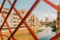 View on Girona city from famous Eiffel bridge Royalty Free Stock Photo