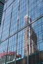 View of glass wall of tower with reflection of skyscrapers in Moscow City. Moscow. Russia Royalty Free Stock Photo