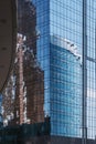 View of glass wall of tower with reflection of skyscrapers in Moscow City. Moscow. Russia Royalty Free Stock Photo