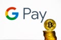 Gold Bitcoin coins with the Google logo on background Royalty Free Stock Photo