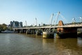 A view of Golden Jubilee and Hungerford bridges from South Bank of Thames River in London