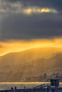 Golden hazy sunset on California beach.