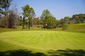 View of Golf Course with beautiful putting green. Golf course with a rich green turf beautiful scenery Royalty Free Stock Photo