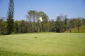 View of Golf Course with beautiful putting green. Golf course with a rich green turf beautiful scenery Royalty Free Stock Photo