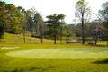 View of Golf Course with beautiful putting green. Golf course with a rich green turf beautiful scenery Royalty Free Stock Photo