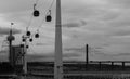 View of Gondola ride at Park of The Nations in Lisbon, Portugal with Vasco da Gama bridge in the background Royalty Free Stock Photo