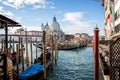 View of gondolas and Santa Maria della Salute church from St Mark`s Square, Venice, Italy Royalty Free Stock Photo