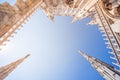 view of Gothic architecture and art on the roof of Milan Cathedral (Duomo di Milano), Italy