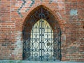 Gothic brick window with metal decoration