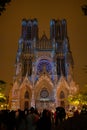 View on gothic Roman Catholic cathedral church Notre-Dame at night in central part of old French city Reims, France Royalty Free Stock Photo