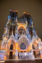 View on gothic Roman Catholic cathedral church Notre-Dame at night in central part of old French city Reims, France Royalty Free Stock Photo