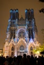 View on gothic Roman Catholic cathedral church Notre-Dame at night in central part of old French city Reims, France Royalty Free Stock Photo