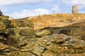 Lunar-like landscape of the opencast copper mine at Parys Mountain including the Grade II Listed windmill, Amlwch, Anglesey Royalty Free Stock Photo